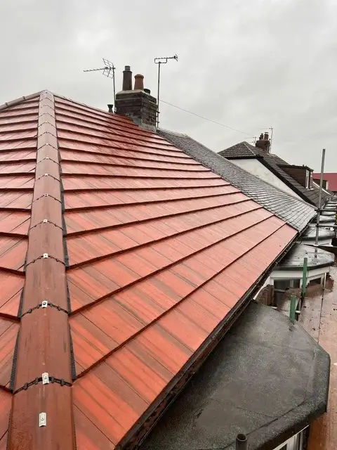 Recent roof replacement project by Emperor Roofing